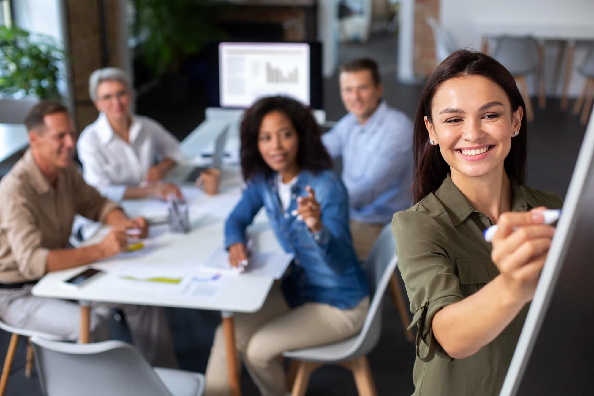 A HR professional planning a workshop to promote mental wellness at work.