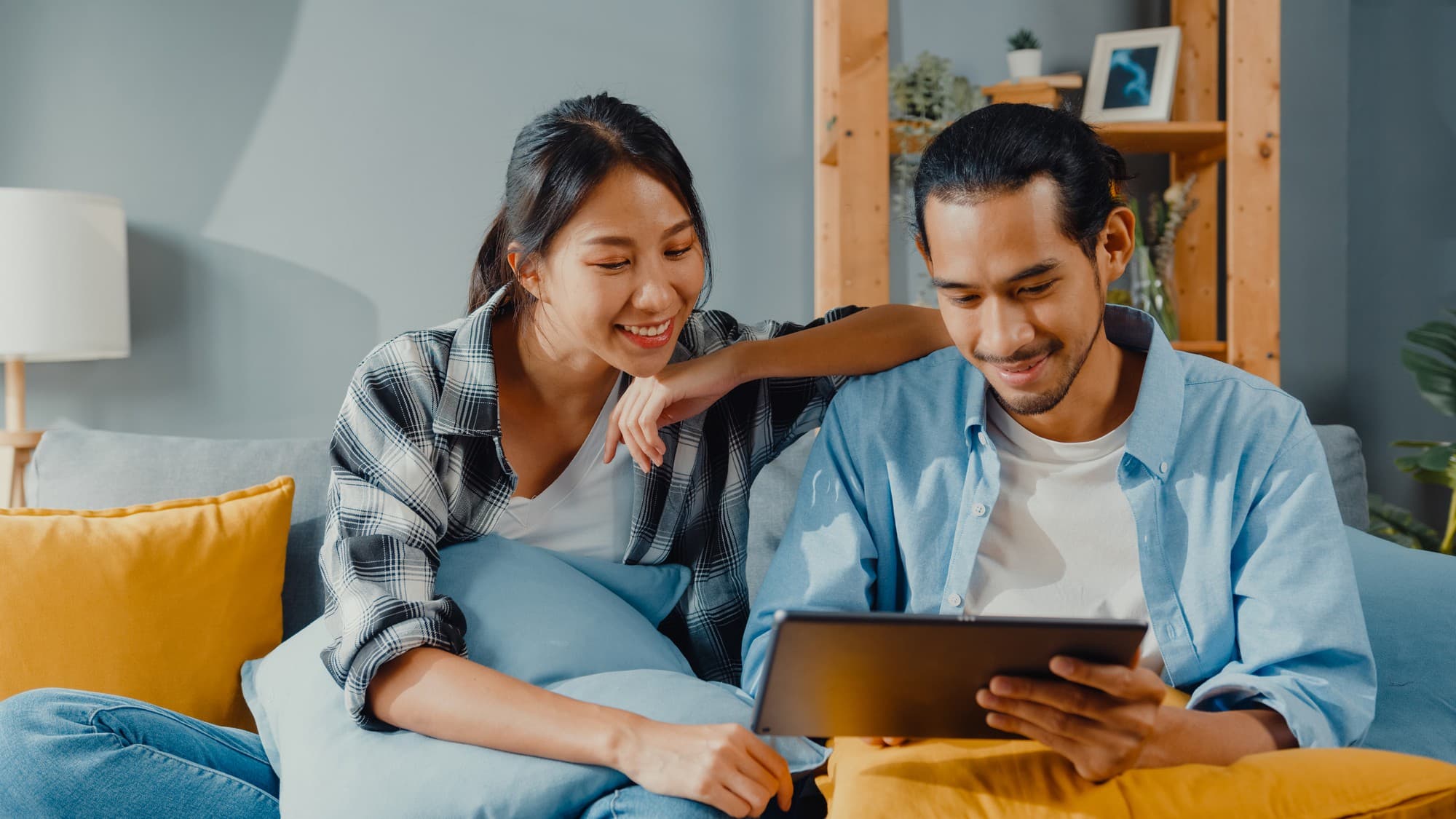 A Singaporean couple getting ready for their first online couples therapy session.