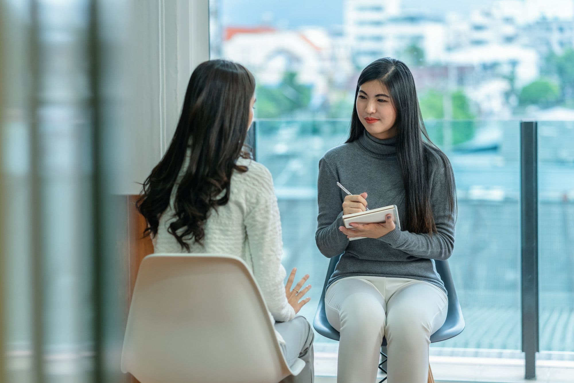 A person engaging in individual counselling to navigate family conflicts.
