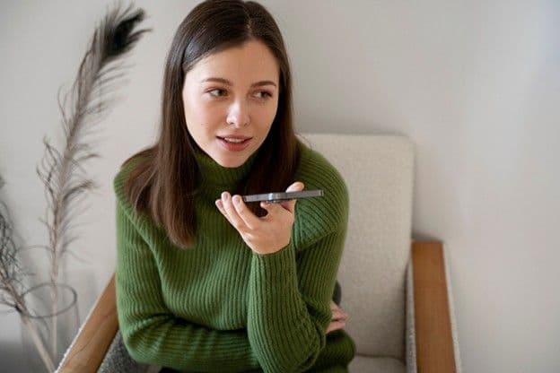 A person engaged in an audio-based online counselling session with their online counsellor.